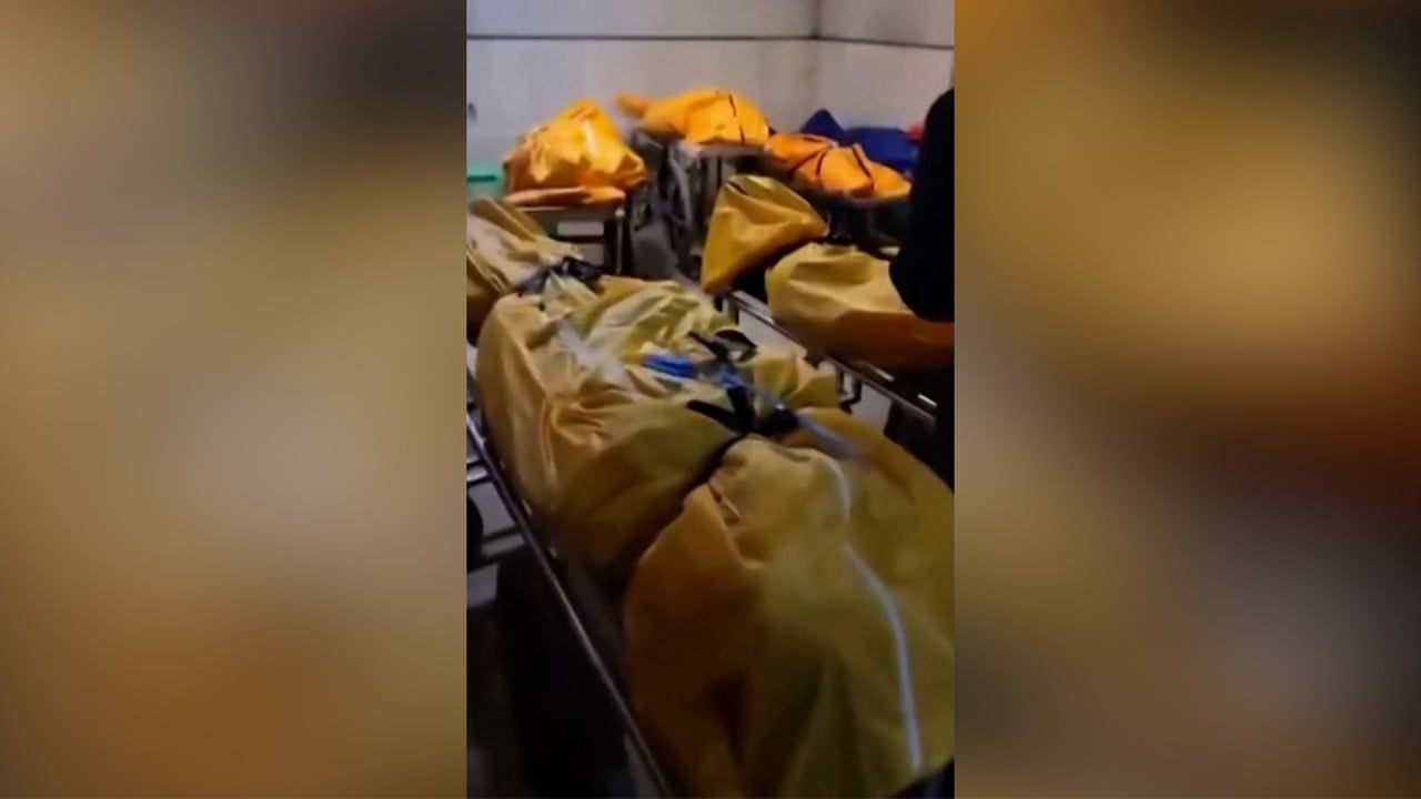 Body bags fill corridors at Chongqing funeral parlour as China battles Covid surge