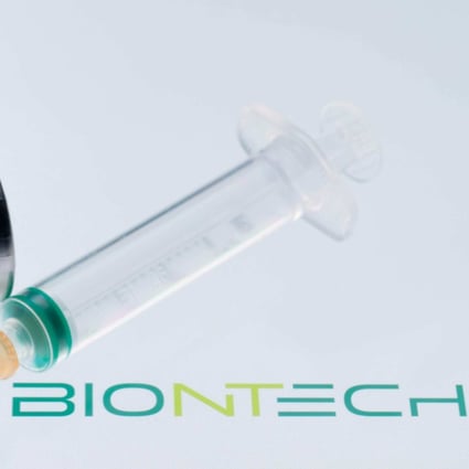 (FILES) This file illustration picture taken on November 24, 2020 shows a bottle reading “Vaccine COVID-19” and a syringe next to the Pfizer and BioNtech logos. - Mexico will receive the first vaccines against COVID-19, developed by Pfizer and BioNTech, on December 23, 2020, Mexican Foreign Minister Marcelo Ebrard announced on December 22. (Photo by JOEL SAGET / AFP)