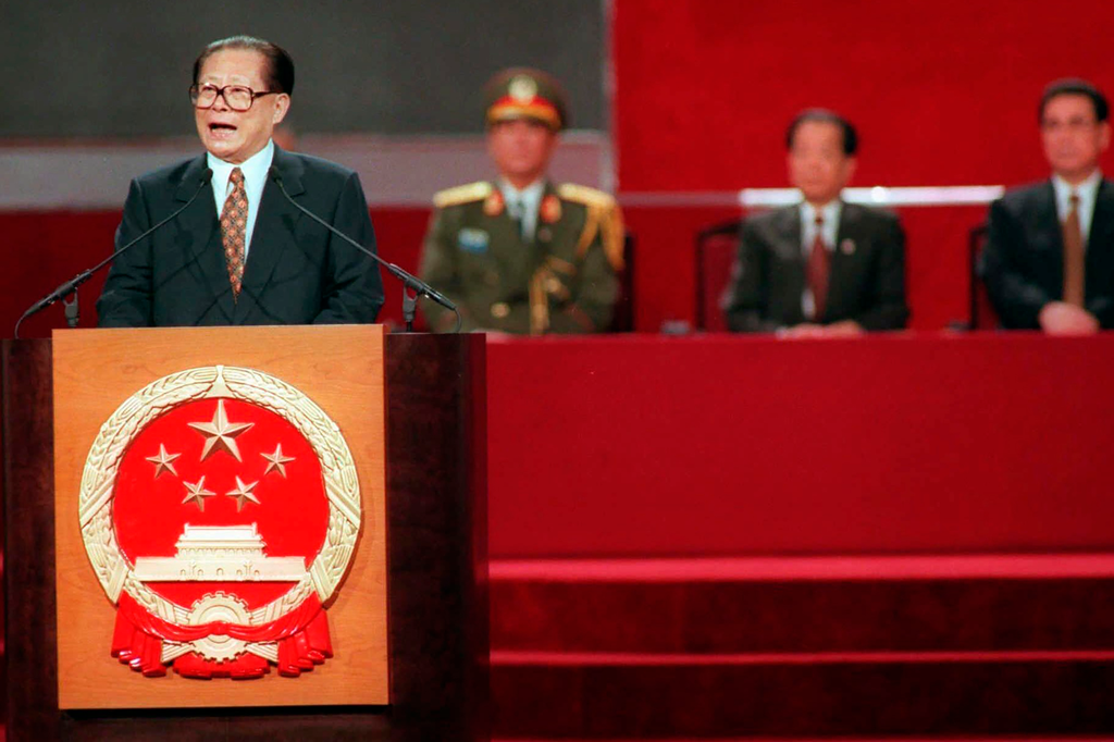 JZM_recollections_002.png Chinese President Jiang Zemin delivers his speech during the handover ceremony in Hong Kong, June 30, 1997. Credit: Pool via Associated Press