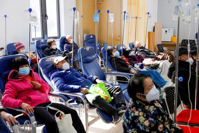 ENG_CHN_COVIDPneumonia_01092023.2.JPG Patients receive IV drip treatment at a community health service center in Shanghai, China, Monday, Jan. 9, 2023. Credit: cnsphoto via Reuters