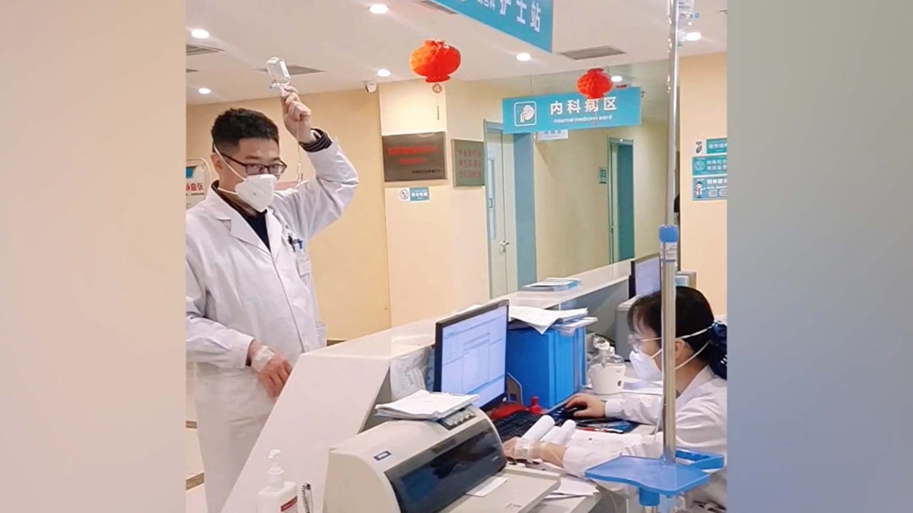 Medics work while hooked up to IV drips during Covid-19 surge in China