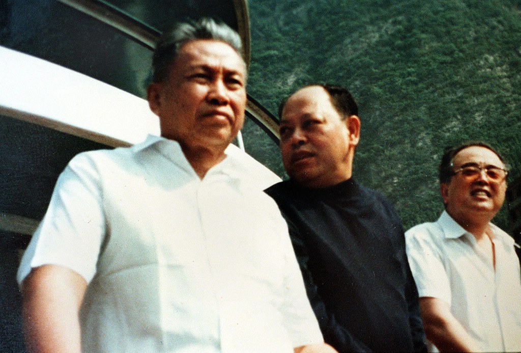 An undated photo of Cambodian dictator Pol Pot [left] with former Khmer Rouge foreign minister Ieng Sary [center] was found in the guerilla leader’s former stronghold of Anlong Veng by an Agence France-Presse reporter on March 28, 1998. The picture was believed to be taken in China in the late 1970's, according to Pich Chheang, former Khmer Rouge ambassador to China. Credit: AFP