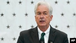 FILE - CIA Director William Burns speaks at CIA headquarters in Langley, Virginia, July 8, 2022.