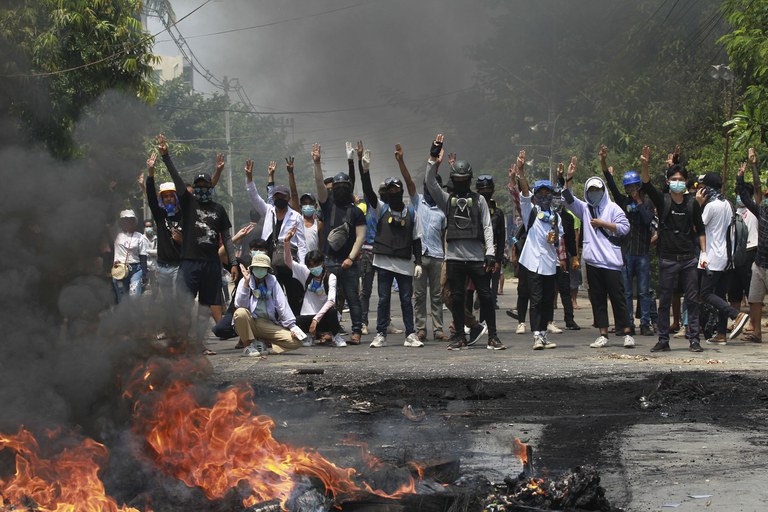 ENG_BUR_AntiTerrorismLaw_03152023-103A.JPG In this March 27, 2021 photo, anti-coup protesters gesture with a three-fingered salute, a symbol of resistance during a demonstration in Thaketa township Yangon, Myanmar. (AP Photo)