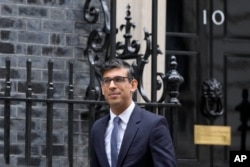 Britain's Prime Minister Rishi Sunak leaves 10 Downing Street for the House of Commons for his weekly Prime Ministers Question's in London, March 15, 2023.