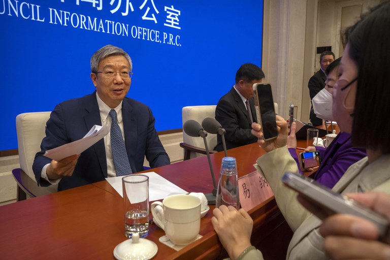 Yi Gang, governor of the People's Bank of China, speaks to journalists after a press conference at the State Council Information Office in Beijing, Friday, March 3, 2023. There are concerns that Chinese President Xi Jinping is moving away from appointing economic technocrats to run the economy. Credit: Associated Press