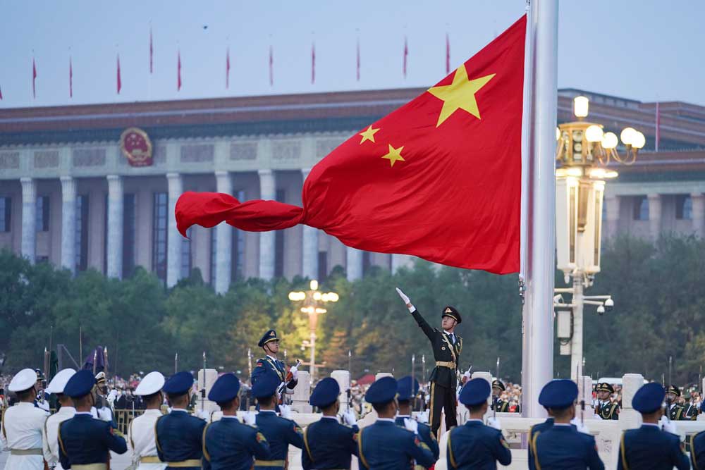 ENG_CHN_YutongHarassment-5.jpg The Chinese national flag is unfurled at Tiananmen Square in Beijing on Saturday, Oct. 1, 2022, to mark the 73rd anniversary of the founding of the People's Republic of China. Journalist Sheng Xue says harassment picks up around these events. Credit: Chen Zhonghao/Xinhua via AP
