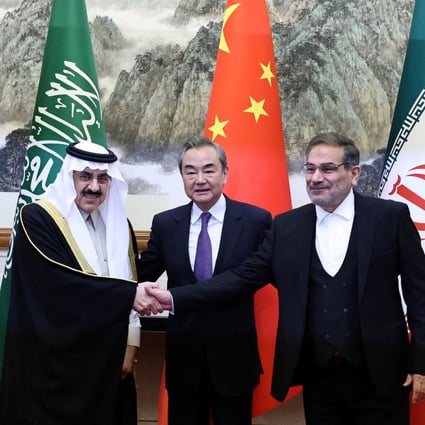 On Friday, Wang Yi, centre, a member of the Politburo of the Communist Party of China (CPC) Central Committee and director of the Office of the Central Foreign Affairs Commission, poses with Iranian Ali Shamkhani, and Saudi Arabian Minister Musaad bin Mohammed Al Aiban. Photo: Reuters