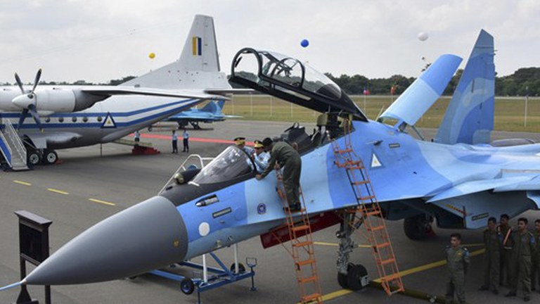 ENG_BUR_AirRaids_03092023.3.jpg Myanmar Junta chief Senior Gen. Min Aung Hlaing inspects a fighter jet during events marking the 75th anniversary of the air force on Dec. 15, 2022. Credit: Myanmar military
