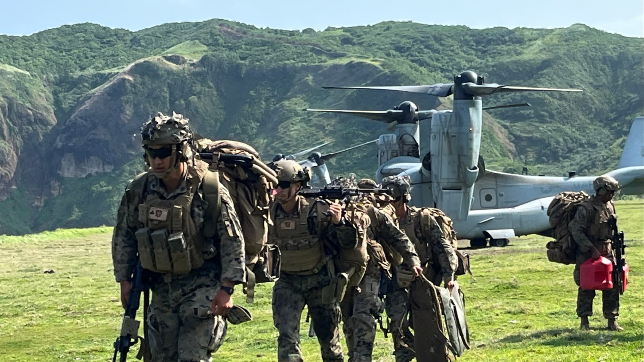 Soldiers near an Osprey tilt-rotor helicopter on Batan Island in the Philippines on Sunday