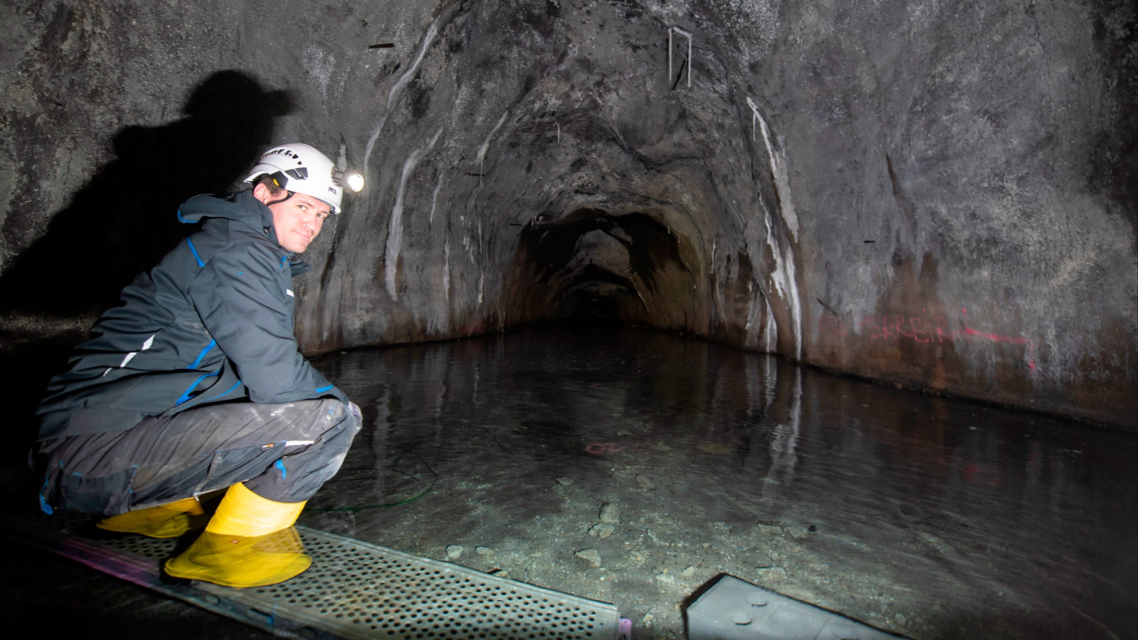 Simon Bodensteiner, chief executive of Deutsche Flussspat, squats at the entrance to the Käfersteige mine, near Pforzheim in Germany