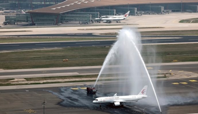 chinas 1st domestically made passenger plane makes inaugural flight