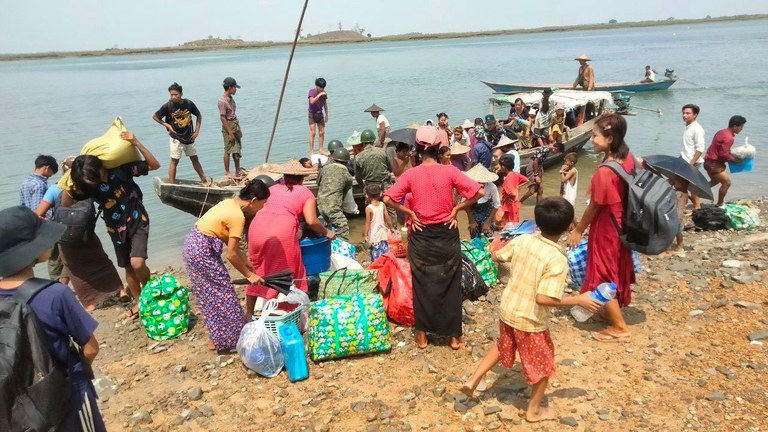 ENG_BUR_MochaPrep_05122023.3.jpg Members of the Arakan Army, an ethnic Rakhine rebel group, evacuates residents from the coast and low-altitude areas in Rakhine state, Myanmar. Credit: Arakan Army