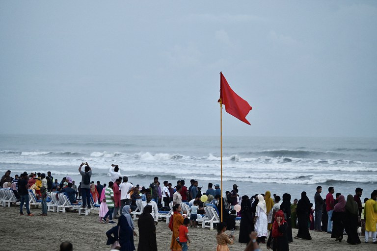 ENG_BUR_MochaPrep_05122023.4.jpg People gather at the beach in Cox’s Bazar, Bangladesh, on Friday, May 12, 2023, ahead of the landfall of cyclone Mocha. Credit: AFP