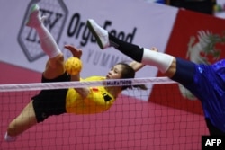 Vietnam's Duong Thi Xuyen kicks the ball in the women's sepak takraw final between Vietnam and Thailand during last year's Southeast Asian Games (SEA Games) in Hanoi on May 21, 2022.