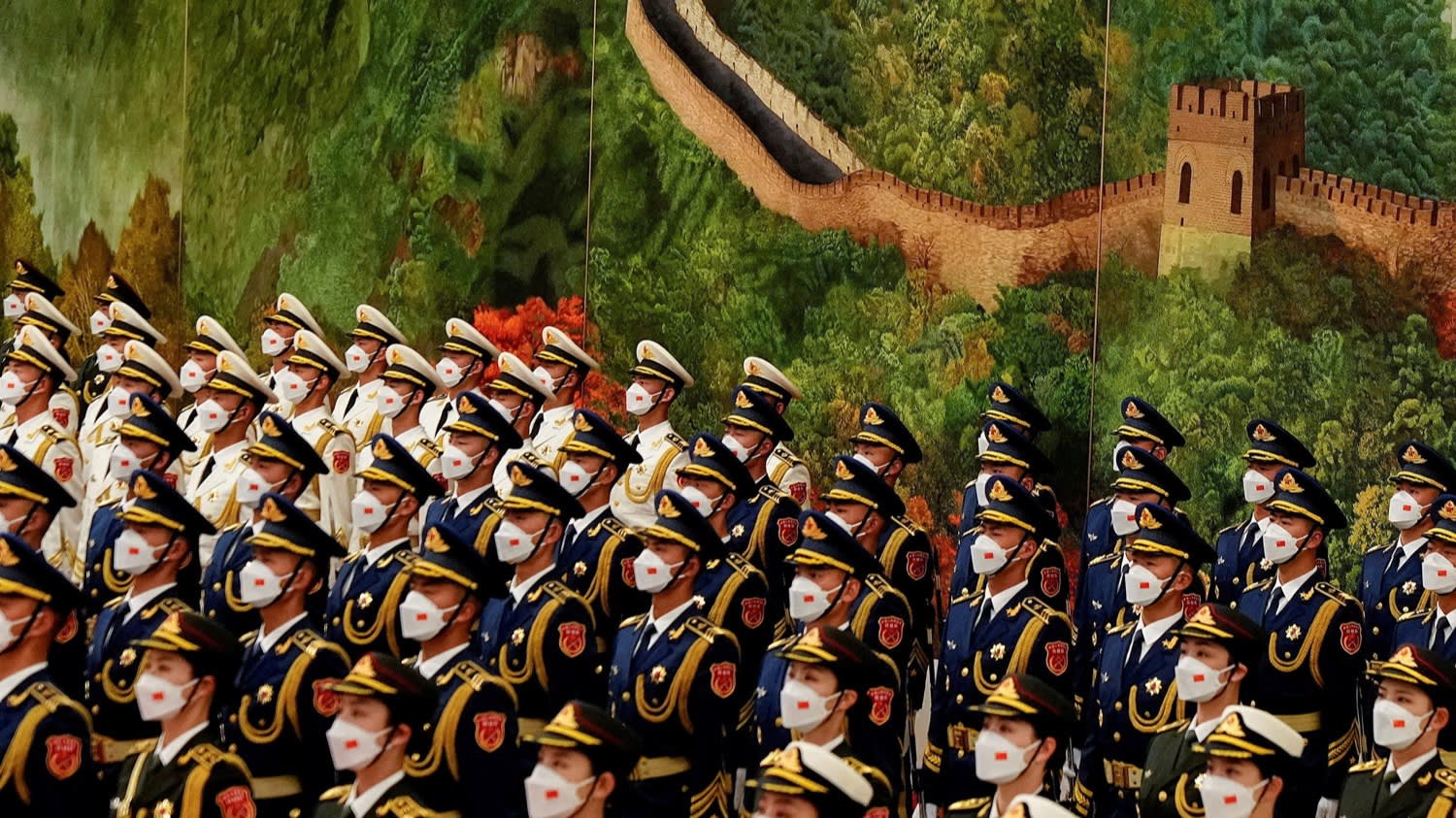 Chinese honor guard members stand during a welcome ceremony