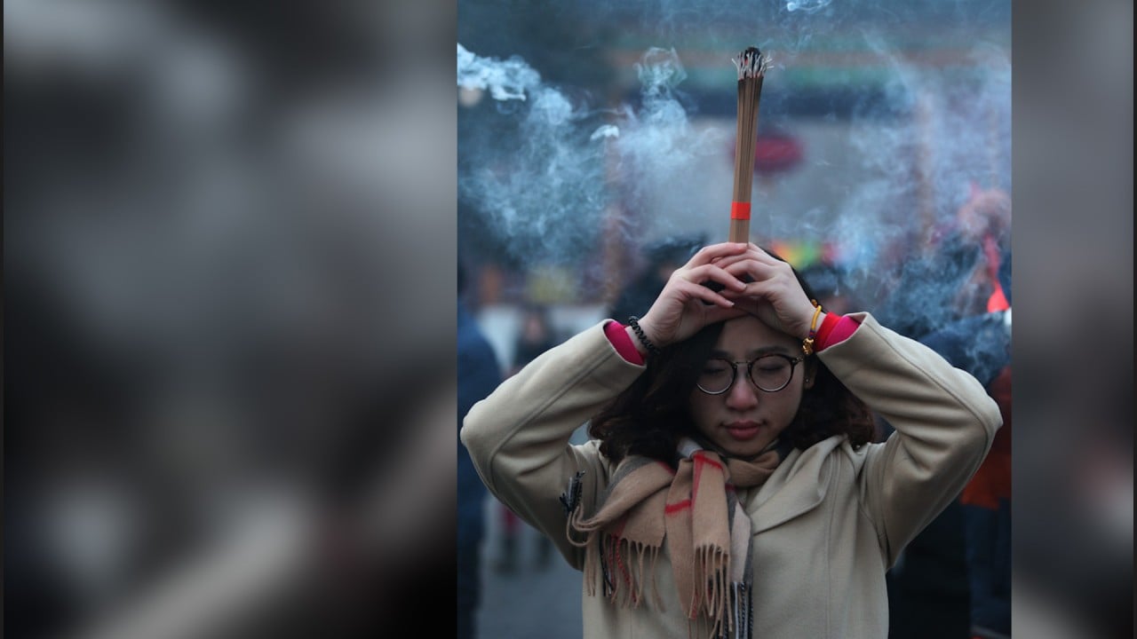 Growing number of young people in China flock to religious temples to escape life’s pressures