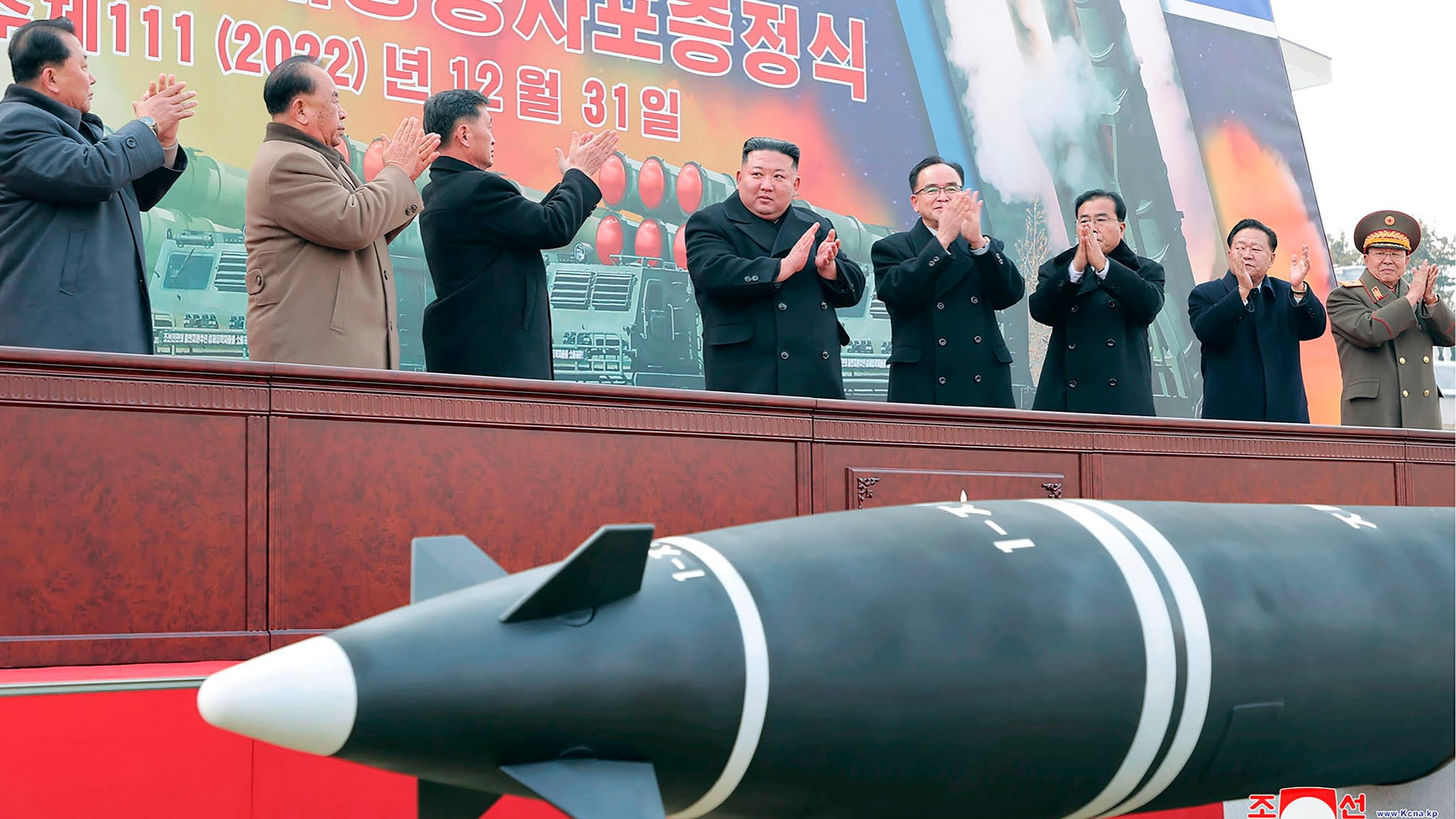 Kim Jong Un, centre, at a weapons ceremony in Pyongyang on December 31