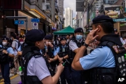 Police patrol near Victoria Park on the 34th anniversary of China's Tiananmen Square crackdown in Hong Kong, June 4, 2023.