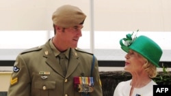 FILE - This handout photo taken and released by Australia's Department of Defense on Jan. 23, 2011 shows Australia's Governor-General Quentin Bryce talking to Corporal Ben Roberts-Smith after awarding him the Victoria Cross.
