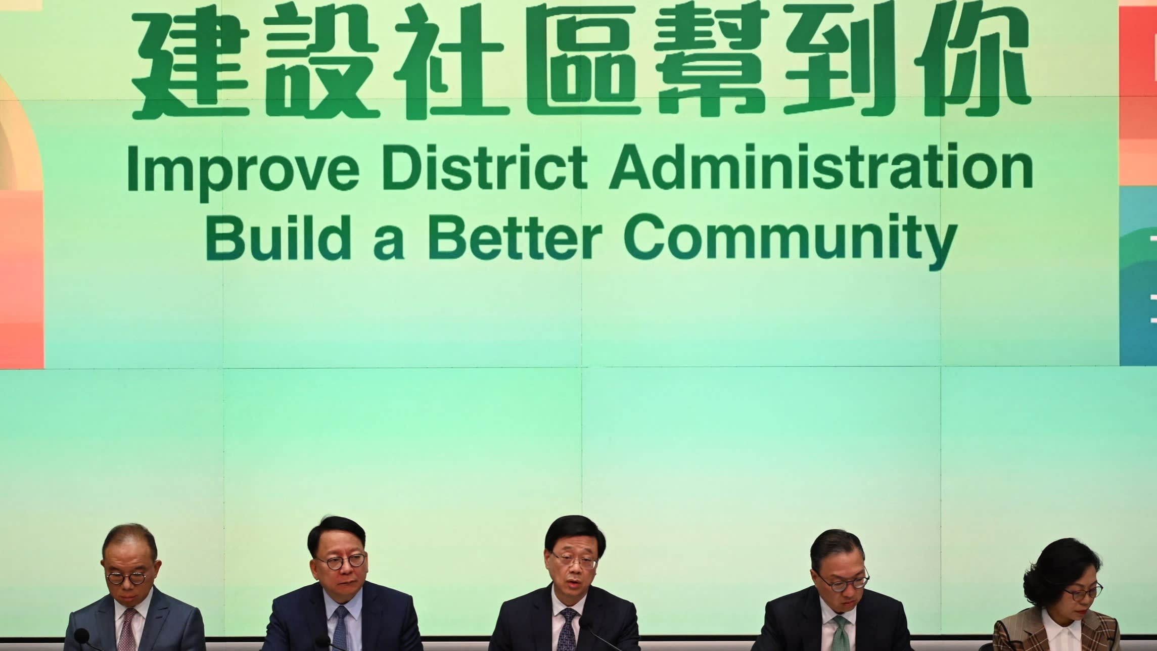 Hong Kong’s secretary for constitutional and mainland Affairs Erick Tsang, chief secretary Eric Chan, chief executive John Lee, secretary for justice Paul Lam and secretary for home affairs Alice Mak at a press conference on Tuesday to announce an overhaul of district council elections