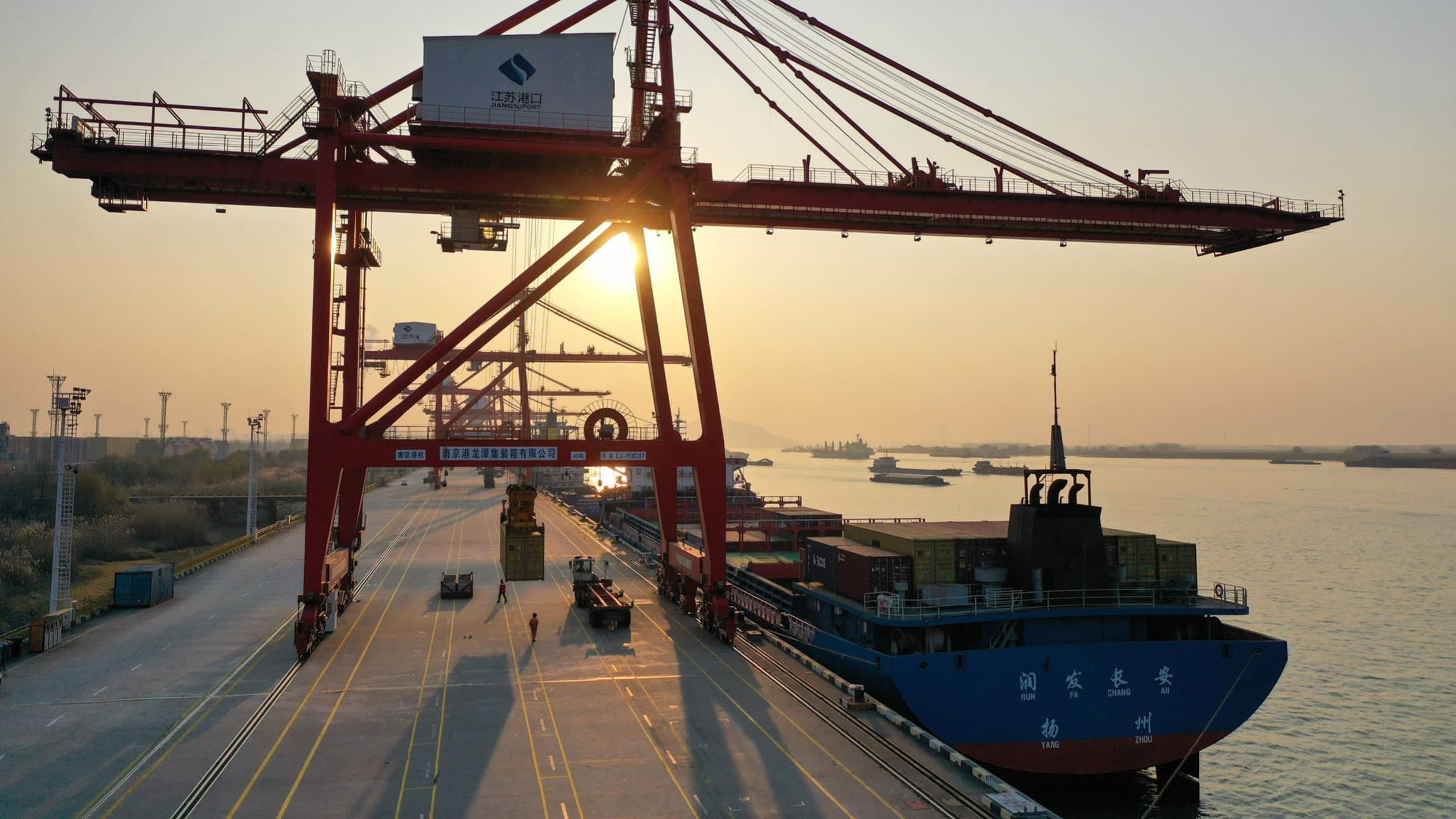 Cranes and cargo ships at Nanjing port in China’s eastern Jiangsu province