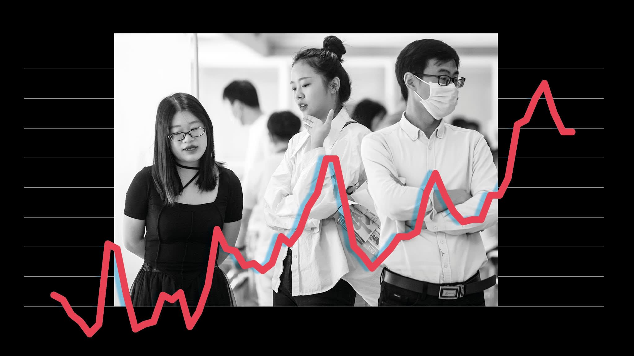 People attend a job fair tailored towards recent and upcoming college graduates. Youth unemployment in China reached a record 21.3 per cent in June