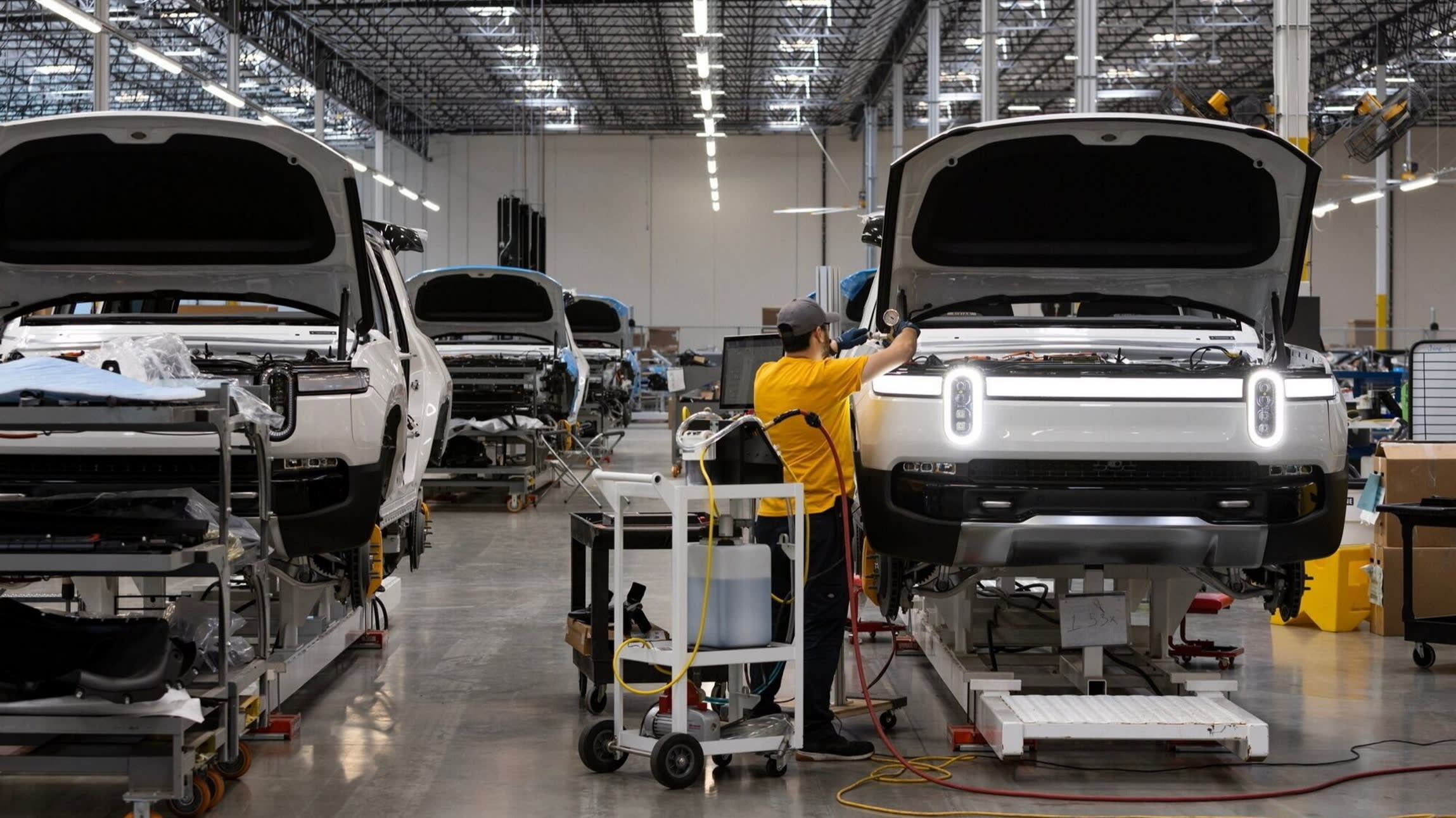 R1S model electric vehicles on the pilot production line at Rivian’s headquarters in Irvine, California