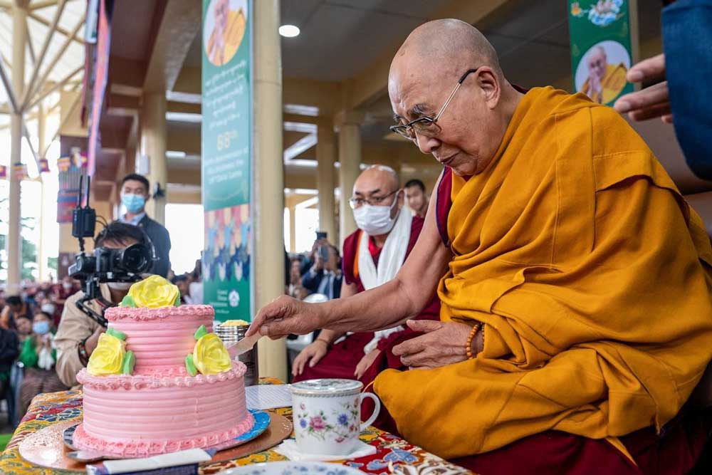 z1-embed-2023-07-06Dharamsala-G-04_SA14872.jpg The Dalai Lama cuts a birthday cake presented to him during the celebration of his 88th birthday at his residence in Dharamsala, India, on Thursday, July 6, 2023. Credit: Tenzin Choejor
