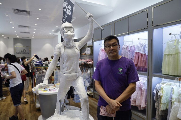 ENG_CHN_HKNatSec_07272023.2.jpg Herbert Chow, who owned the now-shuttered children's clothing chain Chickeeduck, said his "yellow" credentials had massively boosted interest in his high-end products. Credit: Kin Cheung/AP file photo