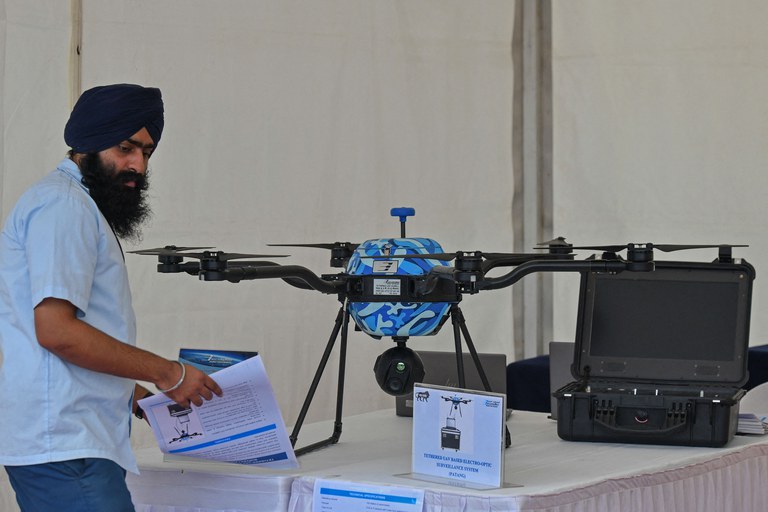 ENG_BUR_IndiaArmsSale_07032023_02.jpg A Hexacopter drone used in unmanned aerial surveillance manufactured by Bharat Electronics is displayed during a defense exhibition in Bangalore, Dec. 2021. Indian arms manufacturer Bharat Electronics Limited transferred military equipment worth more than US$5.1 million to Myanmar’s army over a period of six months from November 2022 to April 2023, the rights group Justice for Myanmar reported in June. Credit: Manjunath Kiran/AFP