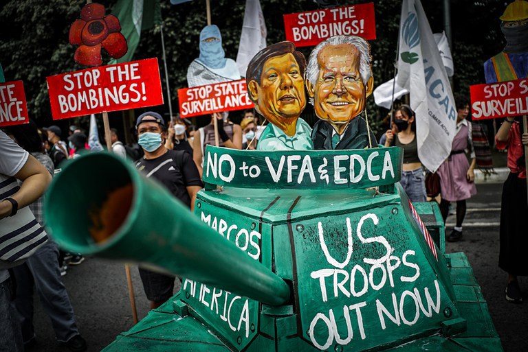 da80167e-0aa9-4b3b-b099-bd006f7a21e0.jpg Filipino activists show their displeasure at newly expanded military ties between the Philippines and the U.S. during street protests in Quezon City, Metro Manila, ahead of President Ferdinand Marcos Jr.’s State of the Nation Speech to Congress, July 24, 2023. Credit: Jojo Riñoza/BenarNews