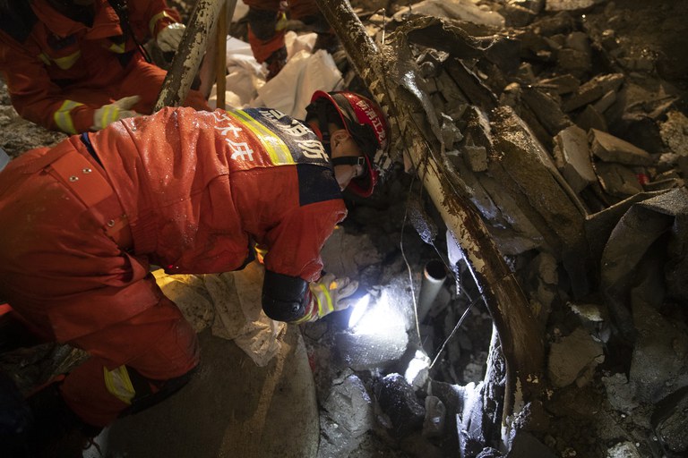 ENG_CHN_QiqiharCollapse_07252023.2.jpg Rescuers search for victims at the site of a school gymnasium roof collapse at Qiqihar No. 34 Junior High School in Qiqihar in northeast China's Heilongjiang province on Monday, July 24, 2023. At least 11 people were killed in the accident. Credit: Zhang Tao/Xinhua via AP