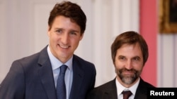 FILE- Steven Guilbeault with Canada's Prime Minister Justin Trudeau after being sworn-in as Minister of Canadian Heritage, at Rideau Hall in Ottawa, Ontario, Canada November 20, 2019.