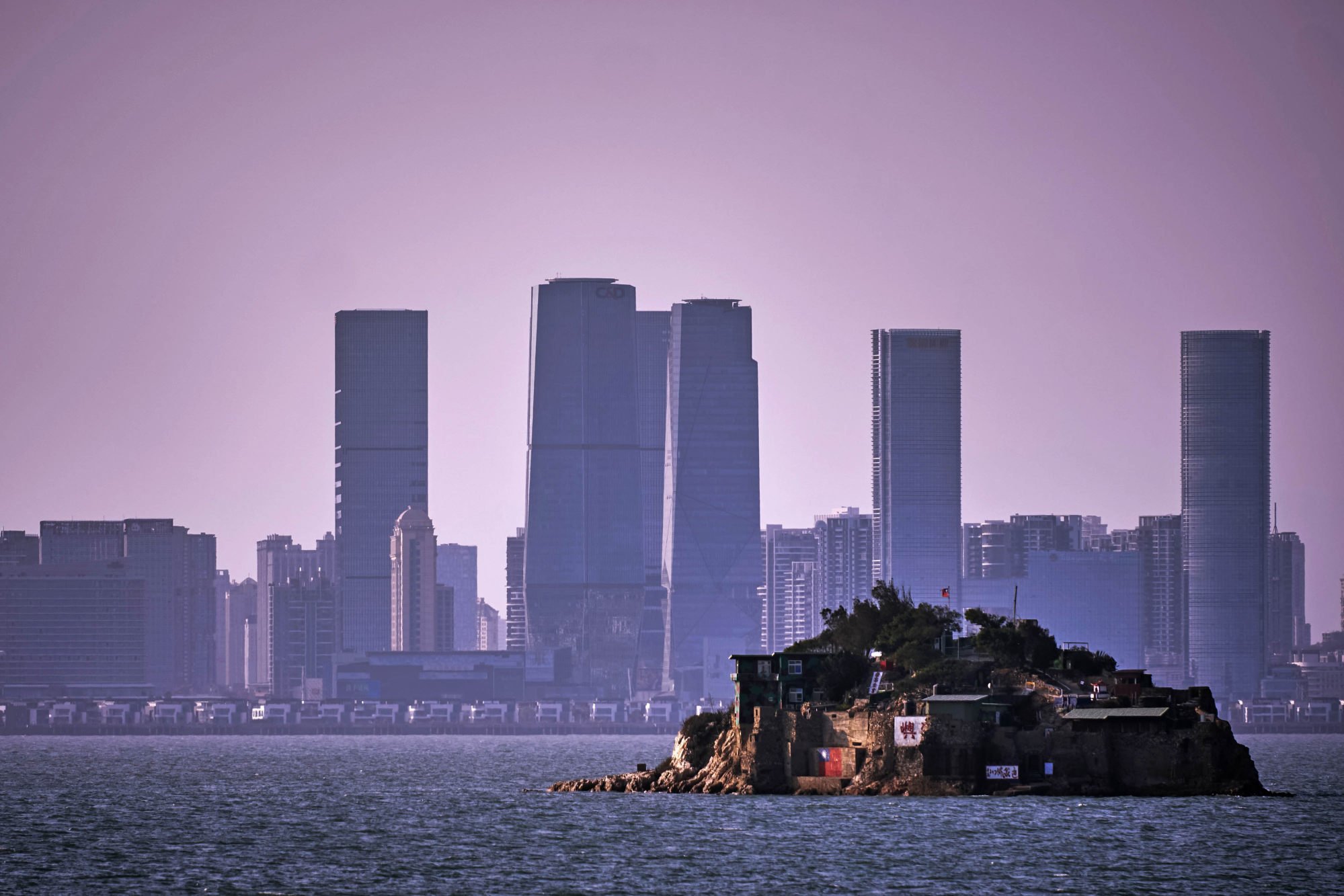 An Island that lies inside Taiwan’s territory is seen with the mainland city of Xiamen in the background. Photo: Getty Images