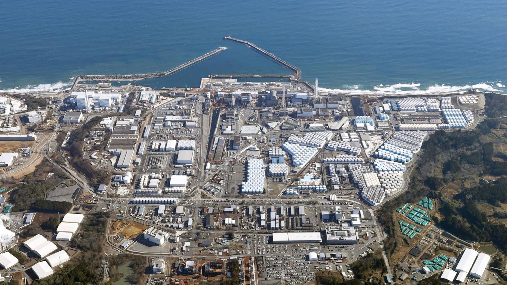 The plant surrounded by water tanks