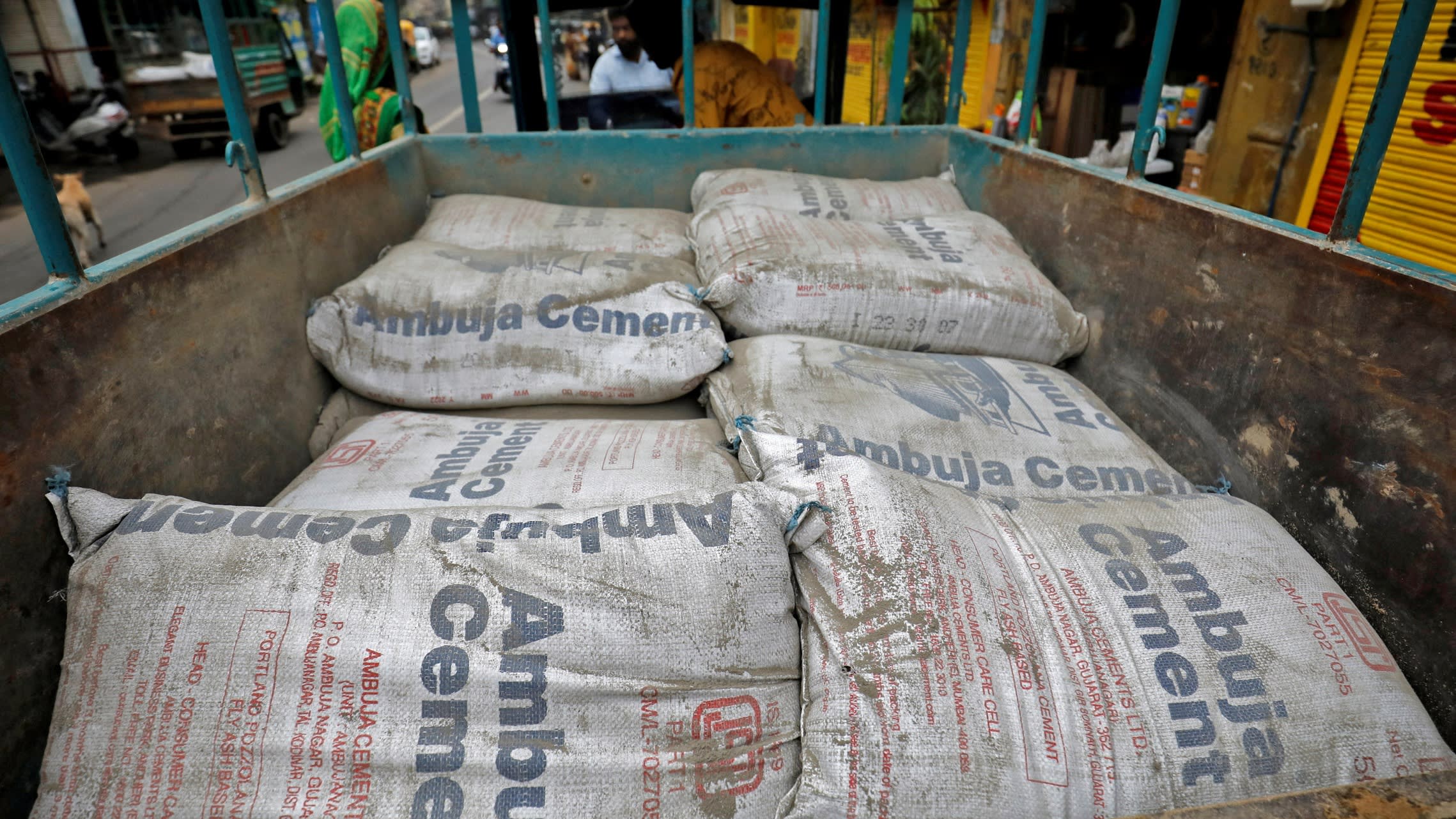 Ambuja Cement bags on a load carrier in Ahmedabad, India
