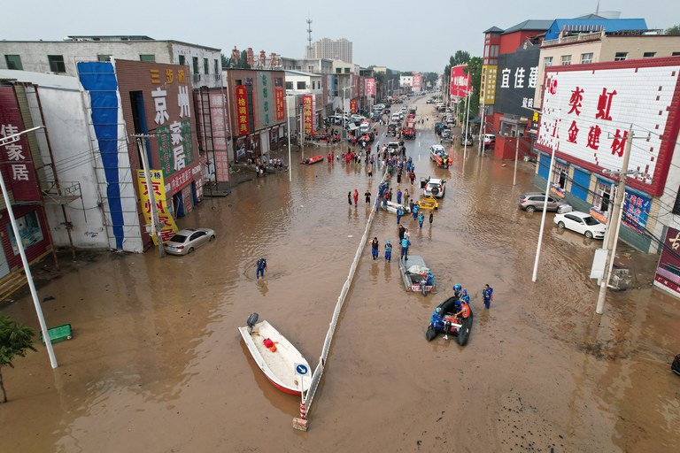 ENG_CHN_BeijingFloods_08042023.4.jpg Rescue teams work in a flooded village after heavy rains in Zhuozhou, Baoding city, in northern China’s Hebei province on Aug. 2, 2023. Credit: Jade Gao/AFP