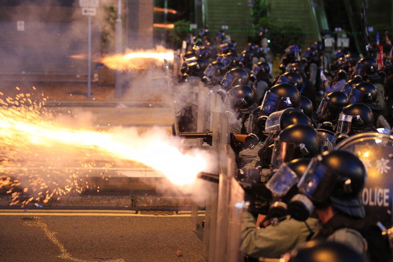 ENG_CHN_HKPolice_08012023.img02.jpg Hong Kong police fire tear gas at protesters in Sai Wan, Hong Kong , July 28, 2019. Credit: Associated Press