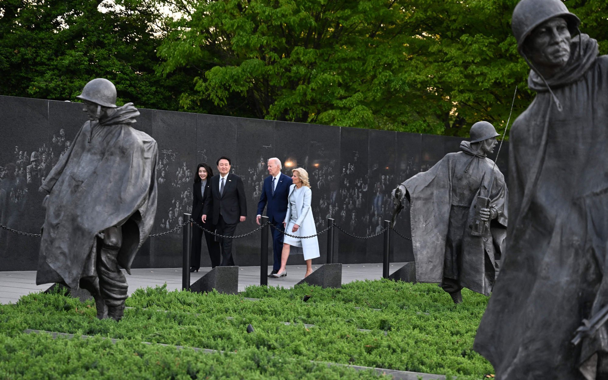 President Joe Biden and Jill Biden and South Korea President Yoon Suk-yeol and his wife, Kim Keon-hee, visit the Korean War Veterans Memorial in Washington on April 25. Photo: TNS