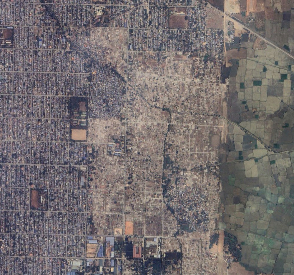 ENG_BUR_ForcedEvictions_08042023.4.jpg The location of a razed neighborhood (light brown in center of image) in Myanmar’s Mandalay region is seen on April 16, 2023. Credit: Airbus
