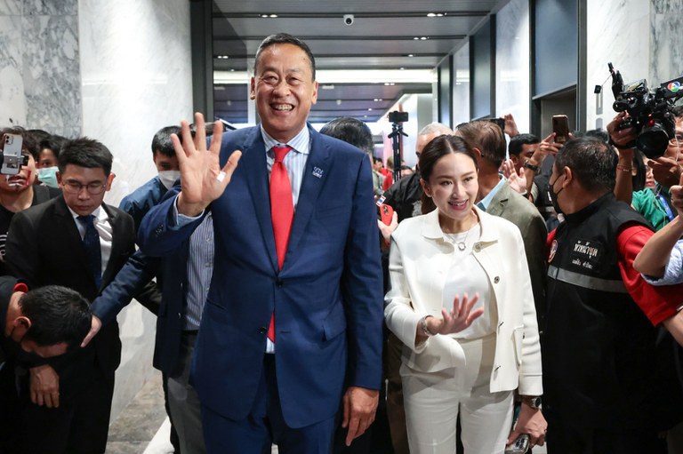 thai1.jpg Srettha Thavisin (left), joined by Paetongtarn Shinawatra, the daughter of Thaskin Shinawatra, greets reporters at Pheu Thai headquarters after receiving enough votes to serve as Thailand’s prime minister, Aug. 22, 2023. Credit: Surin Pinsuwan/BenarNews