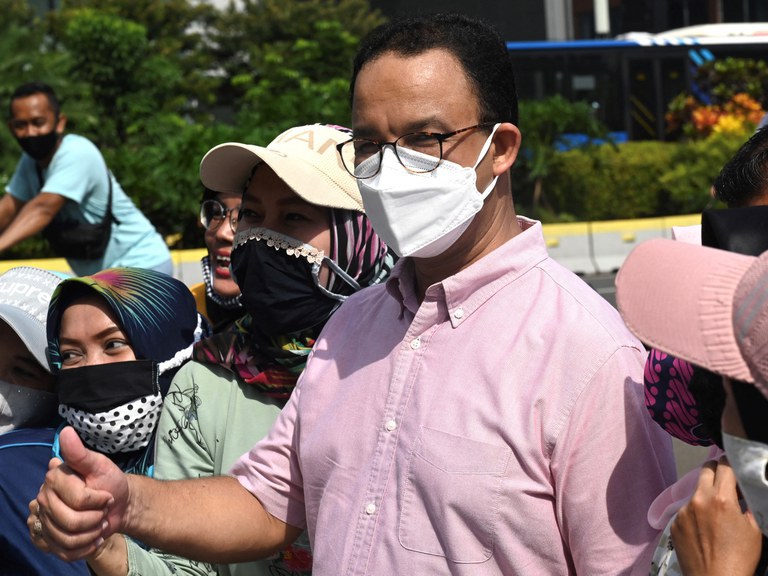 benar2.jpg Then-Jakarta Gov. Anies Baswedan poses with residents along a street in Jakarta, Nov. 1, 2020. Credit: Goh Chai Hin/AFP file photo