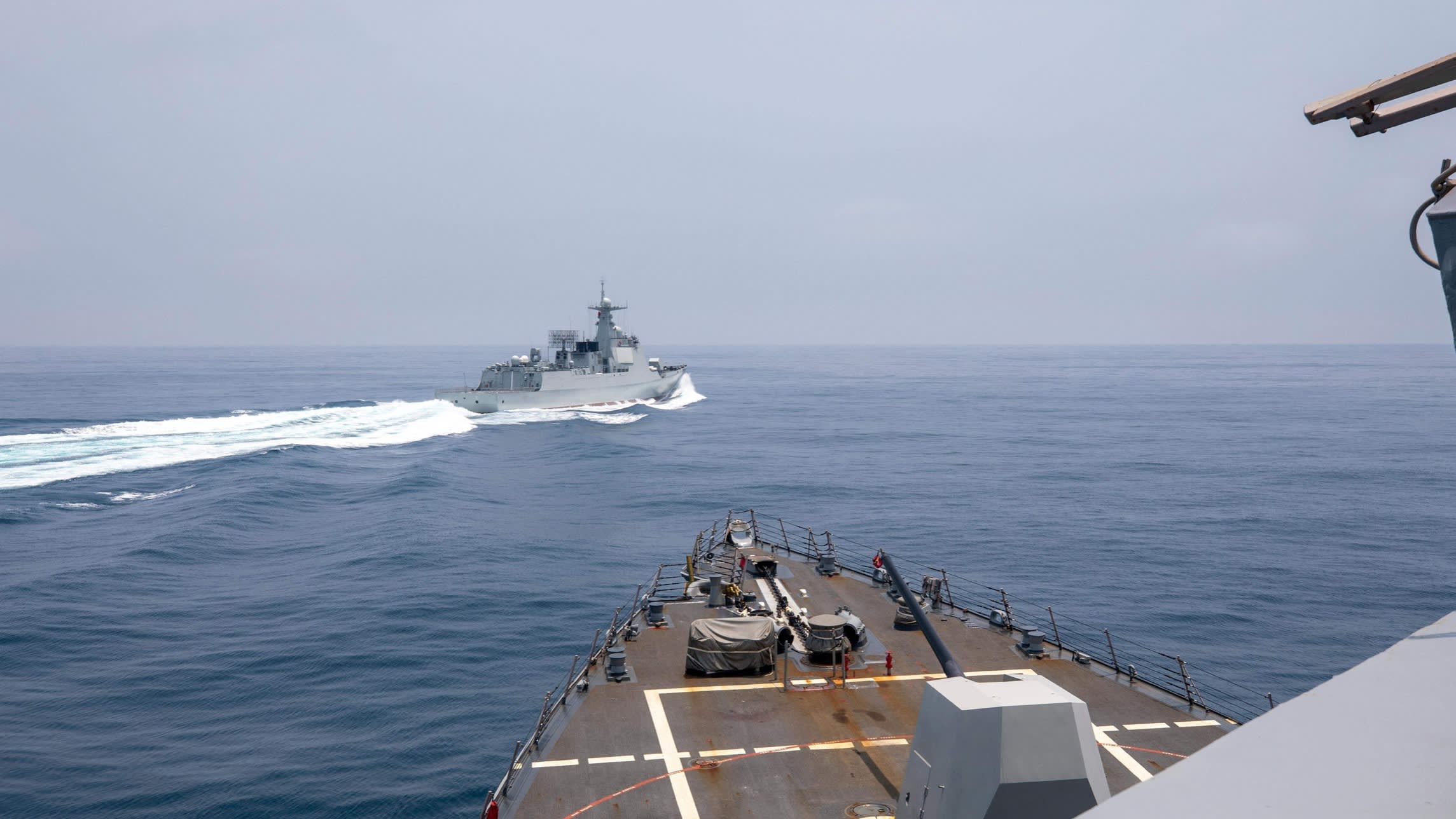 The US Navy’s USS Chung-Hoon observes the Chinese PLA Navy vessel Luyang III while in transit through the Taiwan Strait
