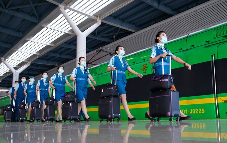 ENG_CHN_Belt_Road10Years_09252023-3.jpg Workers prepare to board a train on the Laos-China Railway at Kunming South Railway Station in Kunming, southwest China's Yunnan province, July 16, 2023. The rail line connects Kunming with Vientiane in Laos. Credit: Chen Xinbo/Xinhua via Getty Images