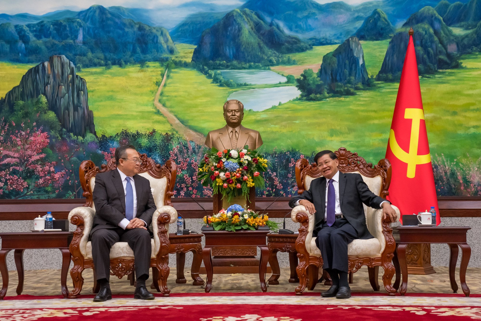 Liu Jianchao also visited Laos as part of his three-country tour, speaking with President Thongloun Sisoulith. Photo: Xinhua