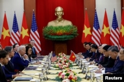 U.S. President Joe Biden attends a meeting with Vietnam's Communist Party General Secretary Nguyen Phu Trong, at the Communist Party of Vietnam Headquarters in Hanoi, Sept. 10, 2023.