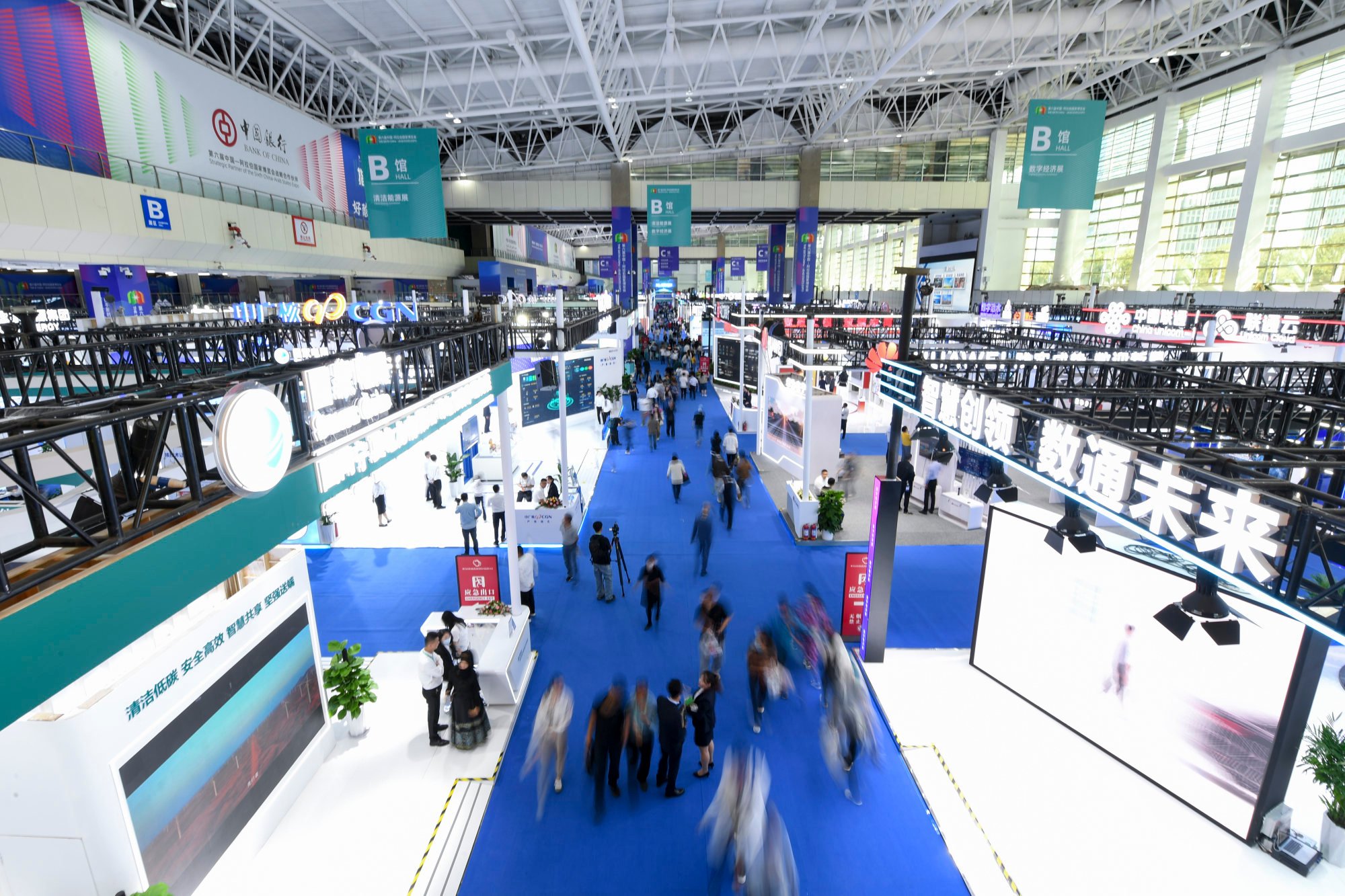 Delegates at the digital economy and clean energy exhibition area. Photo: Xinhua