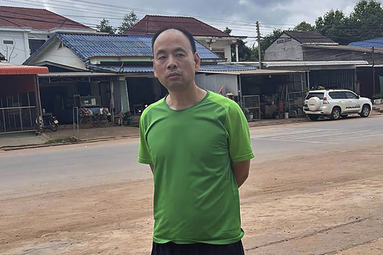 ENG_CHN_LuSiweiRepatriated_09142023_02.jpg Chinese rights lawyer Lu Siwei on a road, at an undisclosed location north of Vientiane, Laos, July 27, 2023, as he headed south to the border with Thailand. Lu, stripped of his license for taking on sensitive cases, was arrested in Laos. Credit: Anonymous Source via AP