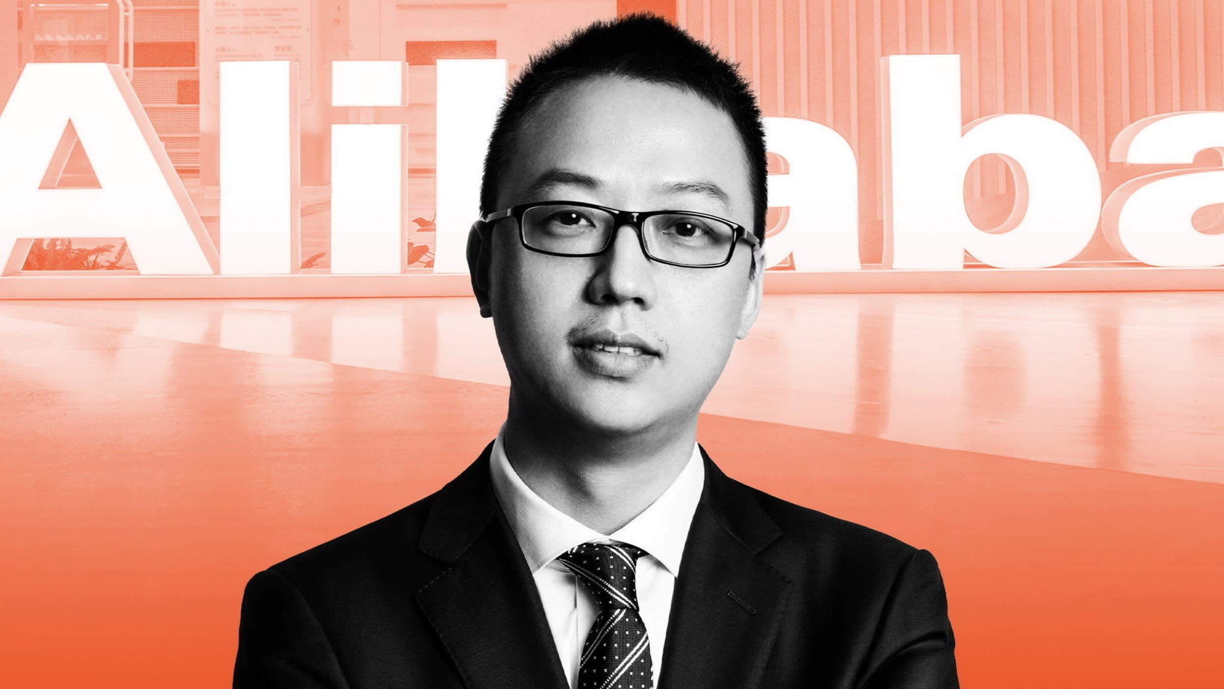 Eddie Yongming Wu with Alibaba logo in the background
